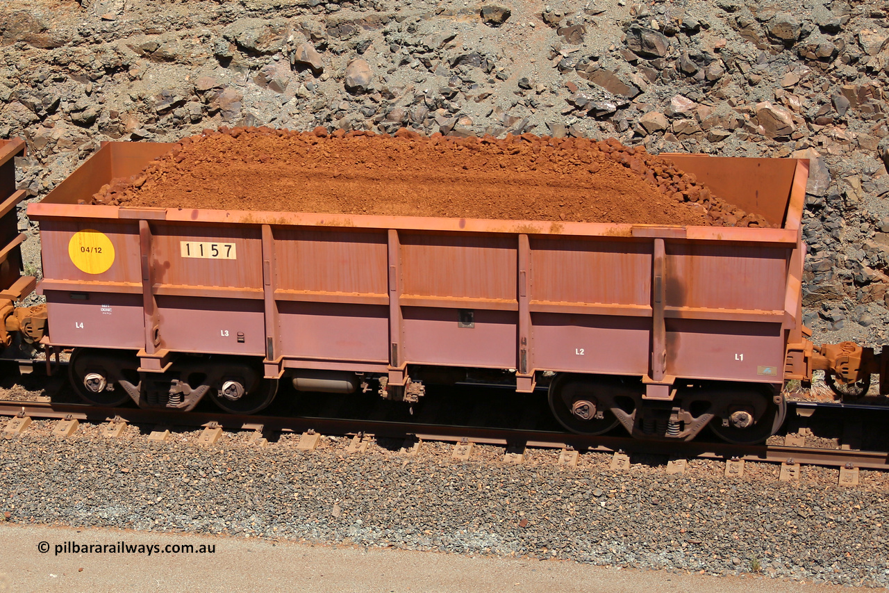 1157 160306 1613
Robe River ore waggon 1157, built by Bradken Rail Qld in April 2012, fixed coupler non-handbrake side loaded view, at the 45 km, Harding Siding on the Cape Lambert line. March 6, 2016.
Keywords: 1157;Bradken-Rail-Qld;Robe-ore-waggon;