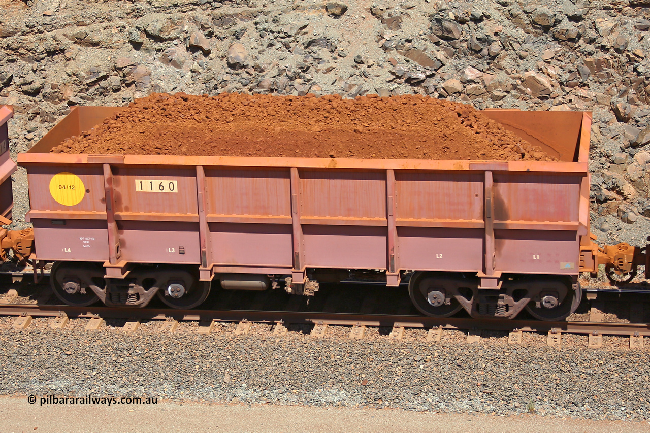 1160 160306 1569
Robe River ore waggon 1160, built by Bradken Rail Qld in April 2012, fixed coupler non-handbrake side loaded view, at the 45 km, Harding Siding on the Cape Lambert line. March 6, 2016.
Keywords: 1160;Bradken-Rail-Qld;Robe-ore-waggon;