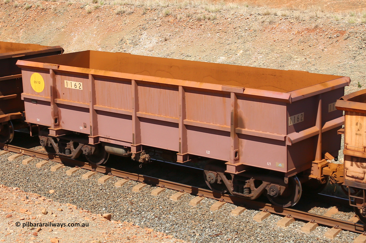 1162 160306 1266
Robe River ore waggon 1162, built by Bradken Rail Qld in May 2012, fixed coupler non-handbrake side empty view at Greenpool on the Cape Lambert line. March 6, 2016.
Keywords: 1162;Bradken-Rail-Qld;Robe-ore-waggon;