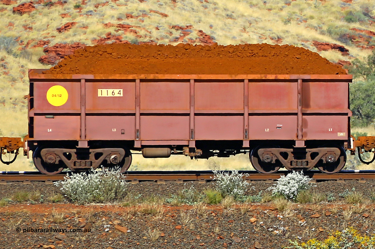 1164 170728 09917
Robe River ore waggon 1164, built by Bradken Rail Qld in April 2012, non-handbrake side loaded view at the 72 km, Western Creek on the Deepdale line. July 28, 2017.
Keywords: 1164;Bradken-Rail-Qld;Robe-ore-waggon;