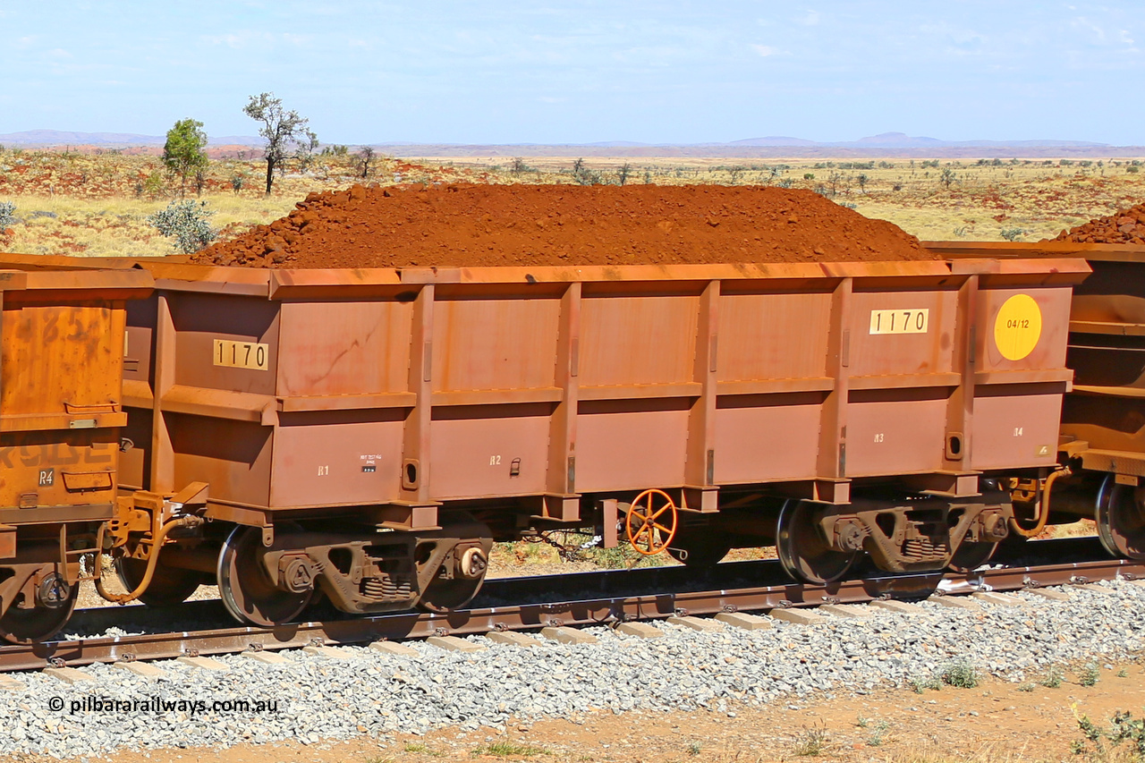 1170 170729 0234
Robe River ore waggon 1170, built by Bradken Rail Qld in April 2012, fixed coupler handbrake side loaded view at the 103 km, between Maitland Siding and the Fortescue River on the Deepdale line. July 29, 2017.
Keywords: 1170;Bradken-Rail-Qld;Robe-ore-waggon;