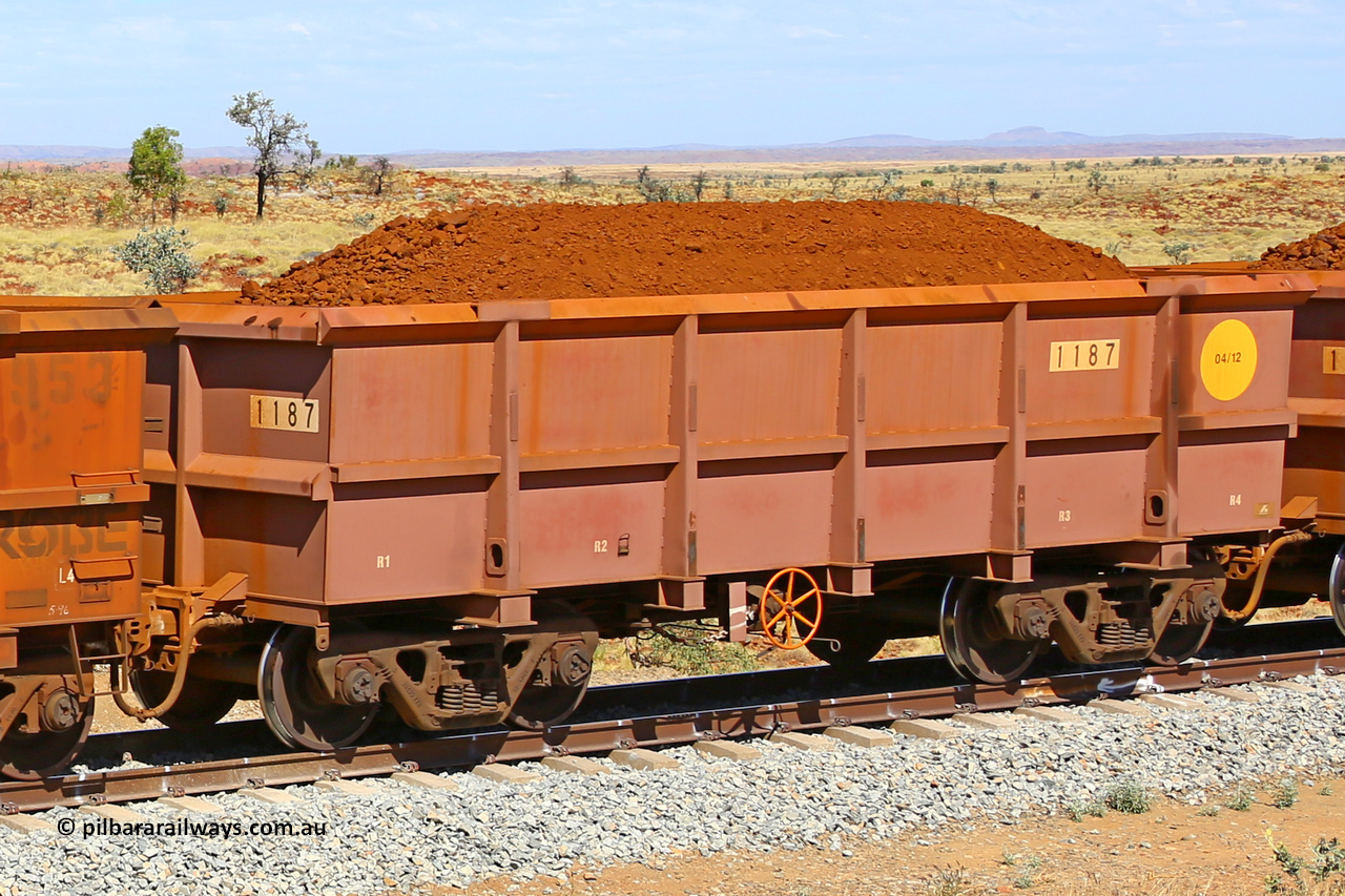 1187 170729 0257
Robe River ore waggon 1187, built by Bradken Rail Qld in April 2012, fixed coupler handbrake side loaded view at the 103 km, between Maitland Siding and the Fortescue River on the Deepdale line. July 29, 2017.
Keywords: 1187;Bradken-Rail-Qld;Robe-ore-waggon;