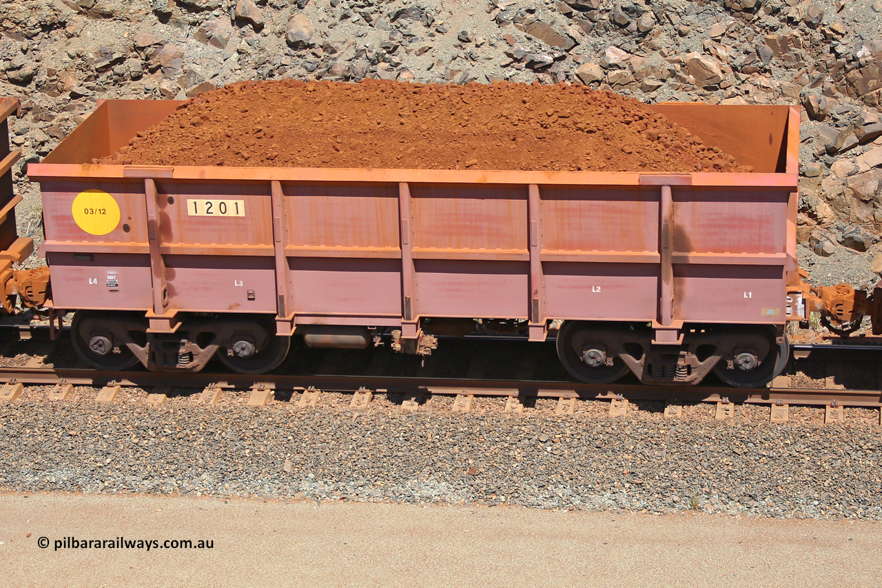 1201 160306 1532
Robe River ore waggon 1201, built by Bradken Rail Qld in March 2012, fixed coupler non-handbrake side loaded view, at the 45 km, Harding Siding on the Cape Lambert line. March 6, 2016.
Keywords: 1201;Bradken-Rail-Qld;Robe-ore-waggon;
