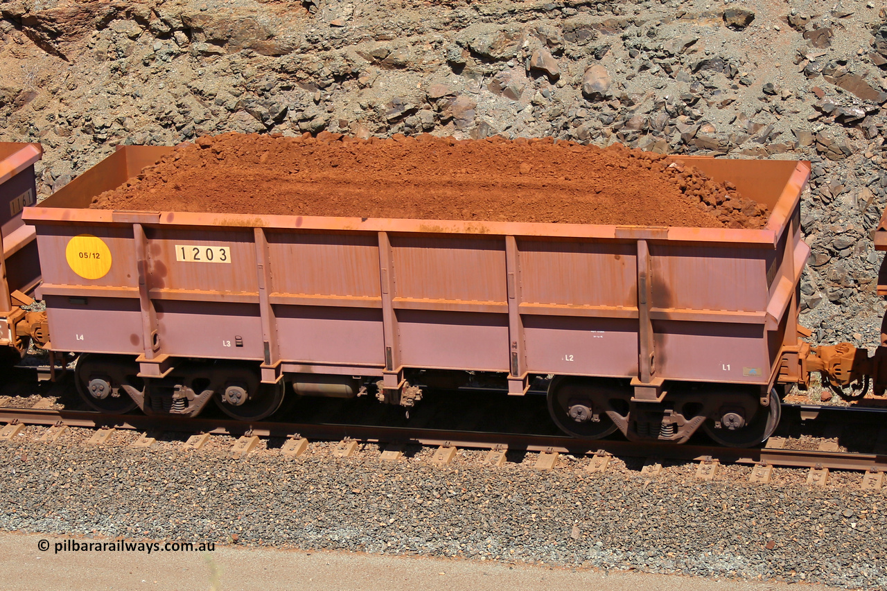 1203 160306 1624
Robe River ore waggon 1203, built by Bradken Rail Qld in May 2012, fixed coupler non-handbrake side loaded view, at the 45 km, Harding Siding on the Cape Lambert line. March 6, 2016.
Keywords: 1203;Bradken-Rail-Qld;Robe-ore-waggon;