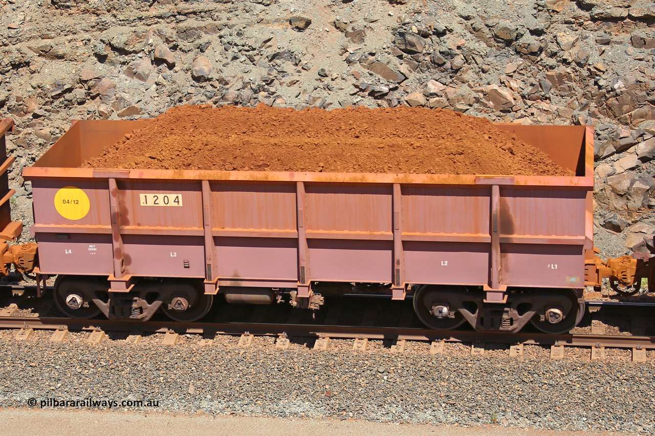 1204 160306 1560
Robe River ore waggon 1204, built by Bradken Rail Qld in April 2012, fixed coupler non-handbrake side loaded view, at the 45 km, Harding Siding on the Cape Lambert line. March 6, 2016.
Keywords: 1204;Bradken-Rail-Qld;Robe-ore-waggon;