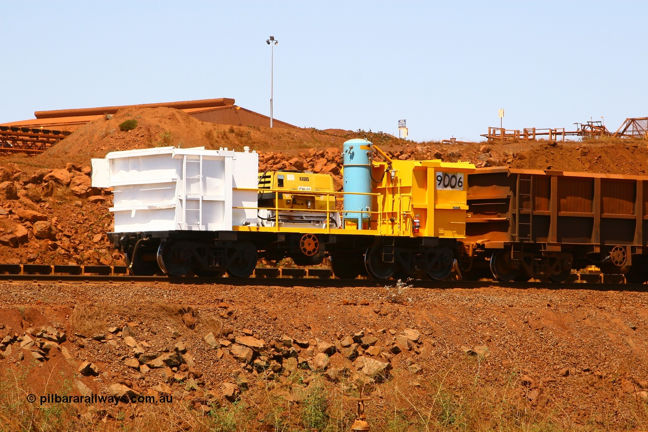 9006 070909 0655
Robe River compressor waggon 9006 on the lead of a Deepdale rake going through the car dumper at Cape Lambert. Fitted with an Atlas Copco XAS 85 compressor, fuel tank and air receiver. This waggon is a modified Tomlinson Steel built ore waggon. 9th August 2007.
Keywords: 9006;robe-compressor-waggon