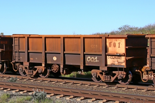 0001 160727 0977
Robe River ore waggon 001, built by Nippon Sharyo Nihon, rotary coupler end handbrake side empty view at Harding Siding on the Cape Lambert line, July 27, 2016.
Keywords: 001;Nippon-Sharyo-Nihon;Robe-ore-waggon;
