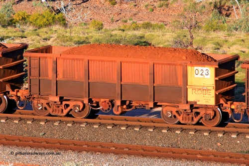 0023 110602 1718
Robe River ore waggon 023, built by Nippon Sharyo Nihon, rotary coupler end handbrake side loaded view at the 71 km, Western Creek on the Deepdale line. June 2, 2011.
Keywords: 023;Nippon-Sharyo-Nihon;Robe-ore-waggon;