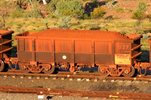 0027 110602 1674
Robe River ore waggon 027, built by Nippon Sharyo Nihon, rotary coupler end handbrake side loaded view at the 71 km, Western Creek on the Deepdale line. June 2, 2011.
Keywords: 027;Nippon-Sharyo-Nihon;Robe-ore-waggon;