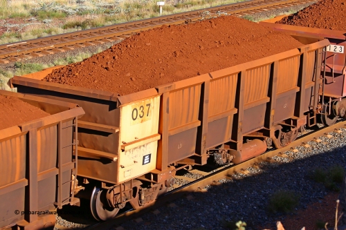 0037 210322 9704
Robe River ore waggon 037, built by Nippon Sharyo Nihon, rotary coupler end non-handbrake side loaded view at the 17 km on the Cape Lambert line, March 22, 2021.
Keywords: 037;Nippon-Sharyo-Nihon;Robe-ore-waggon;