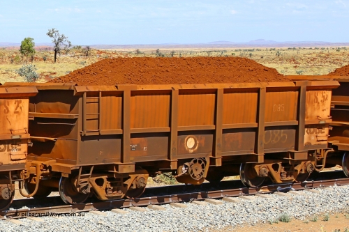 0085 170729 0216
Robe River ore waggon 085, built by Nippon Sharyo Nihon, fixed coupler handbrake side loaded view at the 103 km, between Maitland Siding and the Fortescue River on the Deepdale line. July 29, 2017.
Keywords: 085;Nippon-Sharyo-Nihon;Robe-ore-waggon;