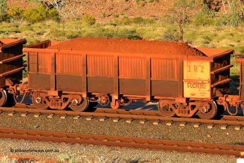 0102 110602 1689
Robe River ore waggon 102, built by Nippon Sharyo Nihon, rotary coupler end handbrake side loaded view at the 71 km, Western Creek on the Deepdale line. June 2, 2011.
Keywords: 102;Nippon-Sharyo-Nihon;Robe-ore-waggon;