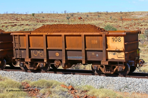 0108 170729 0279
Robe River ore waggon 108, built by Nippon Sharyo Nihon, rotary coupler end handbrake side loaded view, end of train, at the 103 km, between Maitland Siding and the Fortescue River on the Deepdale line. July 29, 2017.
Keywords: 108;Nippon-Sharyo-Nihon;Robe-ore-waggon;