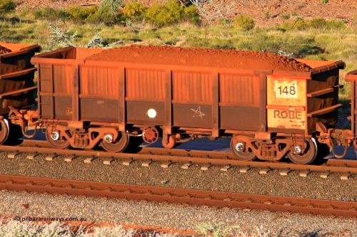 0148 110602 1745
Robe River ore waggon 148, built by Nippon Sharyo Nihon, rotary coupler end handbrake side loaded view at the 71 km, Western Creek on the Deepdale line. June 2, 2011.
Keywords: 148;Nippon-Sharyo-Nihon;Robe-ore-waggon;