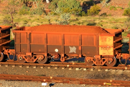 0167 110602 1676
Robe River ore waggon 167, built by Nippon Sharyo Nihon, rotary coupler end handbrake side loaded view at the 71 km, Western Creek on the Deepdale line. June 2, 2011.
Keywords: 167;Nippon-Sharyo-Nihon;Robe-ore-waggon;