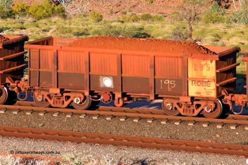 0195 110602 1734
Robe River ore waggon 195, built by Nippon Sharyo Nihon, rotary coupler end handbrake side loaded view at the 71 km, Western Creek on the Deepdale line. June 2, 2011.
Keywords: 195;Nippon-Sharyo-Nihon;Robe-ore-waggon;