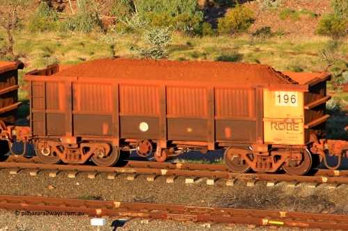 0196 110602 1677
Robe River ore waggon 196, built by Nippon Sharyo Nihon, rotary coupler end handbrake side loaded view at the 71 km, Western Creek on the Deepdale line. June 2, 2011.
Keywords: 196;Nippon-Sharyo-Nihon;Robe-ore-waggon;