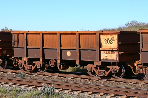 0202 160727 0974
Robe River ore waggon 202, built by Nippon Sharyo Nihon, rotary coupler end handbrake side empty view at Harding Siding on the Cape Lambert line, July 27, 2016.
Keywords: 202;Nippon-Sharyo-Nihon;Robe-ore-waggon;