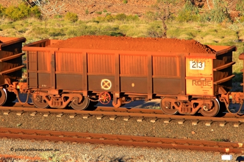 0213 110602 1681
Robe River ore waggon 213, built by Nippon Sharyo Nihon, rotary coupler end handbrake side loaded view at the 71 km, Western Creek on the Deepdale line. June 2, 2011.
Keywords: 213;Nippon-Sharyo-Nihon;Robe-ore-waggon;