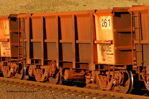 0261 060722 7596
Robe River ore waggon 261, built by Nippon Sharyo Nihon, rotary coupler end handbrake side empty view, at the 11.7 km, Cape Lambert. July 22, 2006.
Keywords: 261;Nippon-Sharyo-Nihon;Robe-ore-waggon;
