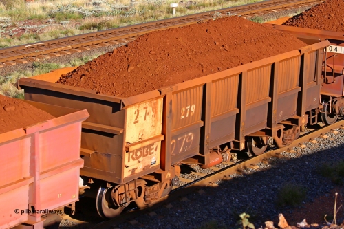 0279 210322 9699
Robe River ore waggon 279, built by Nippon Sharyo Nihon, rotary coupler end non-handbrake side loaded view at the 17 km on the Cape Lambert line, March 22, 2021.
Keywords: 279;Nippon-Sharyo-Nihon;Robe-ore-waggon;