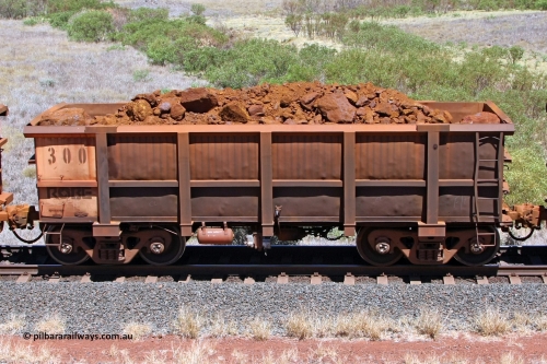 0300 081209 0149
Robe River ore waggon 300, built by Nippon Sharyo Nihon, non-handbrake side loaded view at the 7 km location just south of Cape Lambert yard. December 9, 2008.
Keywords: 300;Nippon-Sharyo-Nihon;Robe-ore-waggon;