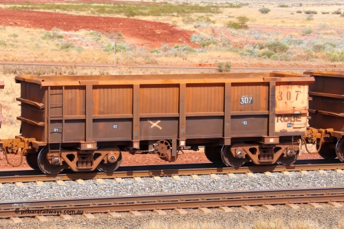 0307 141124 6849
Robe River ore waggon 307, built by Nippon Sharyo Nihon, fixed coupler handbrake side empty view at the 25 km at Arches Siding on the Cape Lambert line. November 24, 2014.
Keywords: 307;Nippon-Sharyo-Nihon;Robe-ore-waggon;
