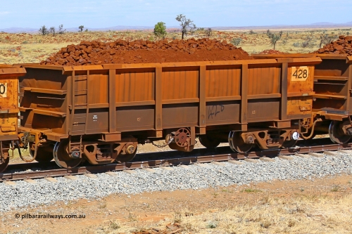 0428 170729 0195
Robe River ore waggon 428, built by Tomlinson Steel WA, fixed coupler handbrake side loaded view at the 103 km, between Maitland Siding and the Fortescue River on the Deepdale line. July 29, 2017.
Keywords: 428;Tomlinson-Steel-WA;Robe-ore-waggon;