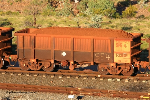 0554 110602 1615
Robe River ore waggon 554, built by Tomlinson Steel WA, rotary coupler end handbrake side loaded view at the 71 km, Western Creek on the Deepdale line. June 2, 2011.
Keywords: 554;Tomlinson-Steel-WA;Robe-ore-waggon;
