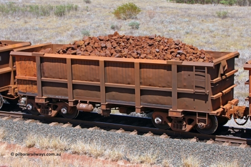 0566 081209 0156
Robe River ore waggon 566, built by Tomlinson Steel WA, fixed coupler non-handbrake side loaded view at the 7 km location just south of Cape Lambert yard. December 9, 2008.
Keywords: 566;Tomlinson-Steel-WA;Robe-ore-waggon;