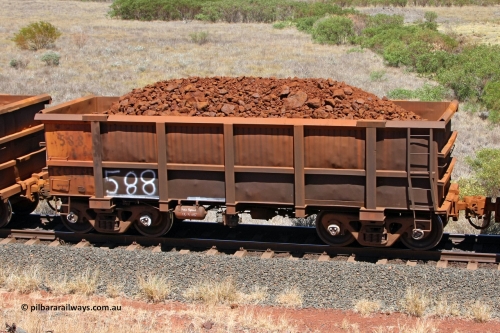 0588 081209 0152
Robe River ore waggon 588, built by Tomlinson Steel WA, fixed coupler non-handbrake side loaded view at the 7 km location just south of Cape Lambert yard. December 9, 2008.
Keywords: 588;Tomlinson-Steel-WA;Robe-ore-waggon;