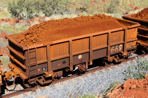 0668 180616 1870
Robe River ore waggon 668, built by Tomlinson Steel WA, fixed coupler handbrake side loaded view at Maitland Siding on the Deepdale line, June 16, 2018.
Keywords: 668;Tomlinson-Steel-WA;Robe-ore-waggon;