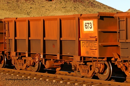 0673 060722 7621
Robe River ore waggon 673, built by Tomlinson Steel WA, rotary coupler end handbrake side empty view, at the 11.7 km, Cape Lambert. July 22, 2006.
Keywords: 673;Tomlinson-Steel-WA;Robe-ore-waggon;
