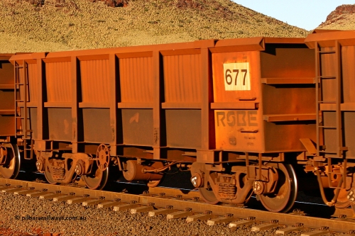 0677 060722 7589
Robe River ore waggon 677, built by Tomlinson Steel WA, rotary coupler end handbrake side empty view, at the 11.7 km, Cape Lambert. July 22, 2006.
Keywords: 677;Tomlinson-Steel-WA;Robe-ore-waggon;