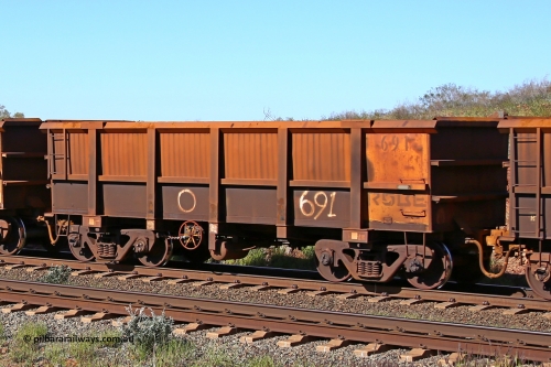 0691 160727 0971
Robe River ore waggon 691, built by Tomlinson Steel WA, rotary coupler end handbrake side empty view at Harding Siding on the Cape Lambert line, July 27, 2016.
Keywords: 691;Tomlinson-Steel-WA;Robe-ore-waggon;