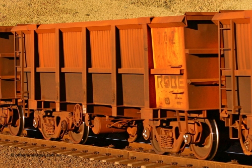 0702 060722 7593
Robe River ore waggon 702, built by Tomlinson Steel WA, rotary coupler end handbrake side empty view, at the 11.7 km, Cape Lambert. July 22, 2006.
Keywords: 702;Tomlinson-Steel-WA;Robe-ore-waggon;