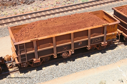 0702 160306 1459
Robe River ore waggon 702, built by Tomlinson Steel WA, fixed coupler handbrake side loaded view, at the 45 km, Harding Siding on the Cape Lambert line. March 6, 2016.
Keywords: 702;Tomlinson-Steel-WA;Robe-ore-waggon;