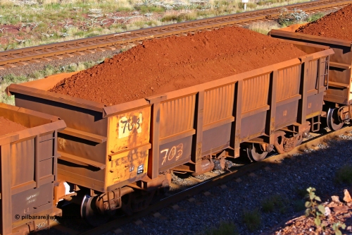 0703 210322 9769
Robe River ore waggon 703, built by Tomlinson Steel WA, rotary coupler end non-handbrake side loaded view at the 17 km on the Cape Lambert line, March 22, 2021.
Keywords: 703;Tomlinson-Steel-WA;Robe-ore-waggon;
