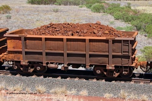 0735 081209 0154
Robe River ore waggon 735, built by Tomlinson Steel WA, fixed coupler non-handbrake side loaded view at the 7 km location just south of Cape Lambert yard. December 9, 2008.
Keywords: 735;Tomlinson-Steel-WA;Robe-ore-waggon;