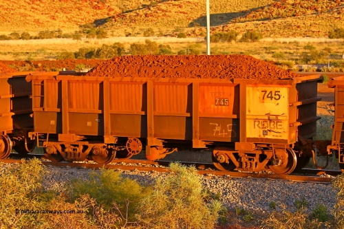 0745 170513 8625
Robe River ore waggon 745, built by Tomlinson Steel WA, rotary coupler end handbrake side loaded view, stencil says TEST 4, Cape Lambert yard, May 13, 2017.
Keywords: 745;Tomlinson-Steel-WA;Robe-ore-waggon;