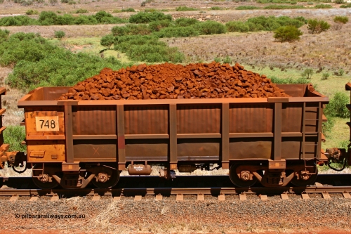 0748 061209 8189
Robe River ore waggon 748, built by Tomlinson Steel WA, non-handbrake side loaded view at the 7 km location just south of Cape Lambert yard. December 9, 2006.
Keywords: 748;Tomlinson-Steel-WA;Robe-ore-waggon;
