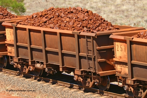 0754 061209 8179
Robe River ore waggon 754, built by Centurion Industries WA, fixed coupler non-handbrake side loaded view at the 7 km location just south of Cape Lambert yard. December 9, 2006.
Keywords: 754;Centurion-Industries-WA;Robe-ore-waggon;