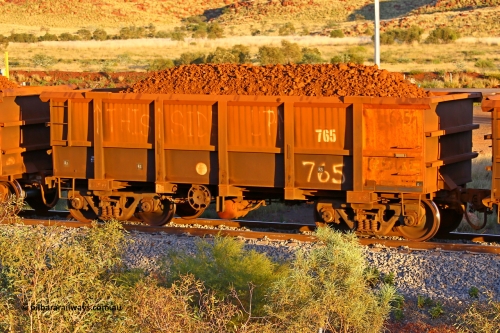 0765 170513 8629
Robe River ore waggon 765, built by Centurion industries WA, rotary coupler end handbrake side loaded view, word say THIS SIDE UP with arrows following a prior derailment, Cape Lambert yard, May 13, 2017.
Keywords: 765;Centurion-Industries-WA;Robe-ore-waggon;