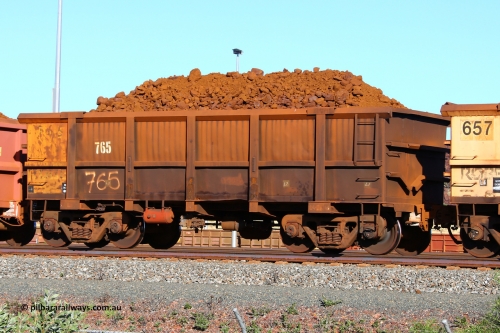 0765 210322 9386
Robe River ore waggon 765, built by Centurion Industries  WA, fixed coupler non-handbrake side loaded view at Cape Lambert yard, March 22, 2021.
Keywords: 765;Centurion-Industries-WA;Robe-ore-waggon;