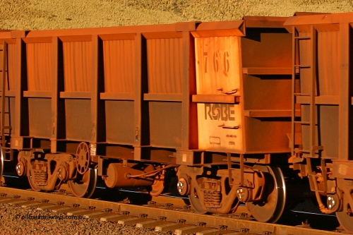0766 060722 7617
Robe River ore waggon 766, built by Centurion Industries WA, rotary coupler end handbrake side empty partial view, at the 11.7 km, Cape Lambert. July 22, 2006.
Keywords: 766;Centurion-Industries-WA;Robe-ore-waggon;