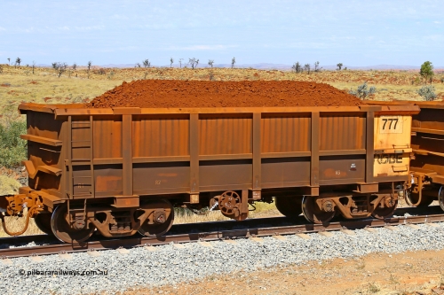 0777 170729 0244
Robe River ore waggon 777, built by Centurion Industries WA, fixed coupler handbrake side loaded view at the 103 km, between Maitland Siding and the Fortescue River on the Deepdale line. July 29, 2017.
Keywords: 777;Centurion-Industries-WA;Robe-ore-waggon;