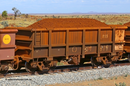 0819 170729 0213
Robe River ore waggon 819, built by Centurion Industries WA, fixed coupler handbrake side loaded view at the 103 km, between Maitland Siding and the Fortescue River on the Deepdale line. July 29, 2017.
Keywords: 819;Centurion-Industries-WA;Robe-ore-waggon;