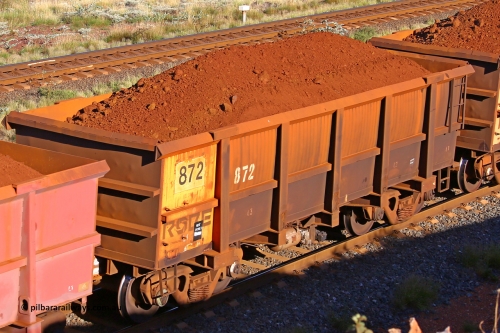 0872 210322 9775
Robe River ore waggon 872, built by Centurion Industries  WA, rotary coupler end non-handbrake side loaded view at the 17 km on the Cape Lambert line, March 22, 2021.
Keywords: 872;Centurion-Industries-WA;Robe-ore-waggon;