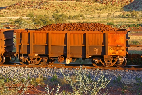 0911 170513 8679
Robe River ore waggon 911, built by Nippon Sharyo Nihon, rotary coupler end handbrake side loaded view, note modified underfloor arrangement, Cape Lambert yard, May 13, 2017.
Keywords: 911;Nippon-Sharyo-Nihon-Japan;Robe-ore-waggon;