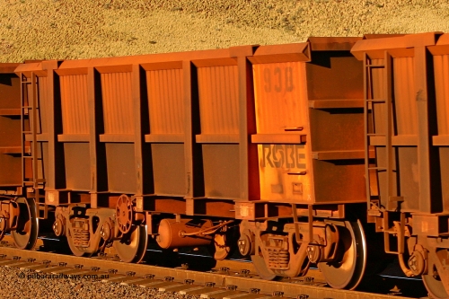0938 060722 7588
Robe River ore waggon 938, built by Centurion Industries WA, rotary coupler end handbrake side empty view, at the 11.7 km, Cape Lambert. July 22, 2006.
Keywords: 938;Centurion-Industries-WA;Robe-ore-waggon;